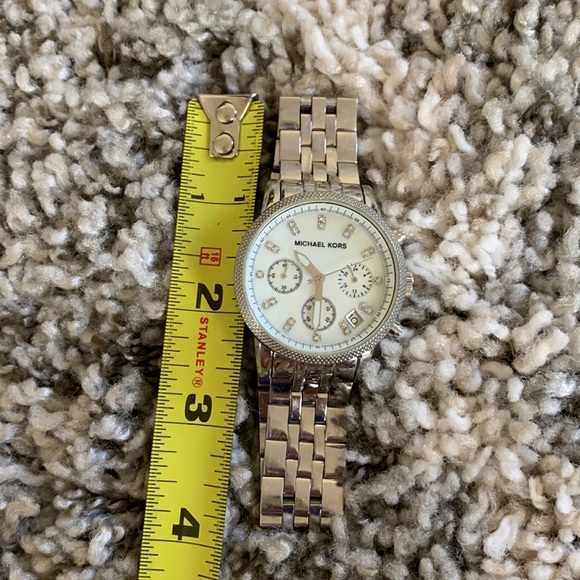 Michael Kors silver watch with pearl face, scratches as shown main image 3